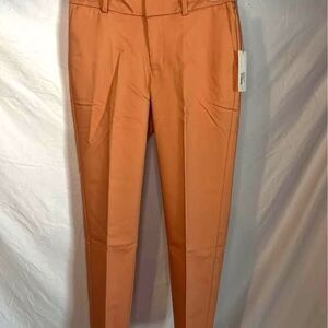 Case pack of 24 coral colored pants size 0